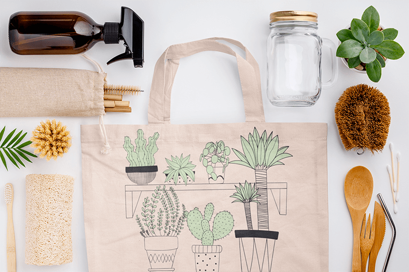Sublimated Tote Bag Mockup Surrounded By Sustainable Products